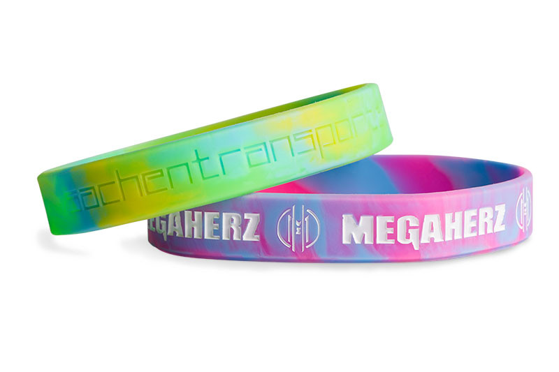 M&ouml;chten Sie sich ohne astronomische Kosten von Ihren Mitbewerbern abheben? Das trendige und kosteng&uuml;nstige Armband aus marmoriertem Kunststoff verleiht all Ihren Veranstaltungen einen Hauch von Originalit&auml;t und wird Ihre Kunden mit Sicherheit beeindrucken. Geben Sie also Ihre Bestellung bei Silibracelets auf: Ihr Silikonarmband-Lieferant entwirft den Werbeartikel, der die Pers&ouml;nlichkeit Ihres Unternehmens perfekt widerspiegelt.